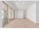 Bright and airy room with sliding glass doors and ceramic tile flooring throughout at 20262 W Monterey Way, Buckeye, AZ 85396
