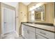 Bright bathroom featuring granite counters, shower and large framed mirror at 20739 N 106Th Ave, Peoria, AZ 85382