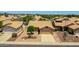 Charming single-story home with a well-manicured front yard and a two-car garage at 20739 N 106Th Ave, Peoria, AZ 85382