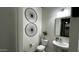 Powder room with vessel sink and round decorative wall art at 2121 E Aquarius Pl, Chandler, AZ 85249