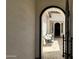 Inviting courtyard with neutral palette, arched entry, tile flooring, and comfortable seating at 2121 E Aquarius Pl, Chandler, AZ 85249