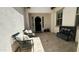 Open courtyard with seating area, tranquil fountain and tiled floor, offering a serene outdoor space at 2121 E Aquarius Pl, Chandler, AZ 85249