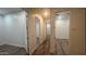 Hallway view showing natural light and leading to other rooms of the home at 2121 E Aquarius Pl, Chandler, AZ 85249