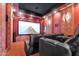 Home theater room with comfortable seating and a large screen at 2371 E Sanoque Ct, Gilbert, AZ 85298
