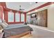 Main bedroom features a built-in entertainment center with a fireplace, providing a cozy retreat at 2371 E Sanoque Ct, Gilbert, AZ 85298