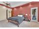 Comfortable main bedroom with tray ceilings, recessed lighting, and private outdoor access, perfect for relaxation at 2371 E Sanoque Ct, Gilbert, AZ 85298