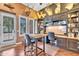A home office offering custom cabinets, built-in shelving, and a workstation for multiple people at 2371 E Sanoque Ct, Gilbert, AZ 85298