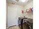 Laundry room with full-size Samsung washer and dryer units at 24035 W La Salle St, Buckeye, AZ 85326