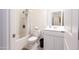 Bright bathroom with a shower-tub combination and a clean, white vanity at 2430 E Alonso Dr, Casa Grande, AZ 85194