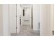 Hallway leading to various rooms, showcasing the home's layout at 2430 E Alonso Dr, Casa Grande, AZ 85194