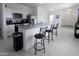 Bright kitchen featuring stainless steel appliances, granite countertops, and a tiled floor at 2430 E Alonso Dr, Casa Grande, AZ 85194