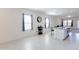 Open living area features modern floors, neutral walls, and lots of natural light at 2430 E Alonso Dr, Casa Grande, AZ 85194