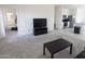 Open floor plan showcasing the living room and kitchen area at 2430 E Alonso Dr, Casa Grande, AZ 85194