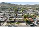 Picturesque neighborhood aerial shot with a view of well-maintained homes and lush trees at 2525 E Nisbet Rd, Phoenix, AZ 85032