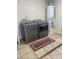 Laundry area with updated machines and tiled flooring at 2525 E Nisbet Rd, Phoenix, AZ 85032