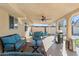 Covered outdoor patio featuring comfortable seating and a built-in barbeque grill at 2525 E Nisbet Rd, Phoenix, AZ 85032