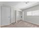 Carpeted bedroom with closet and plenty of natural light at 2650 W Union Hills Dr # 269, Phoenix, AZ 85027