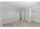 Carpeted bedroom featuring closet with overhead lighting and access to bathroom at 2650 W Union Hills Dr # 269, Phoenix, AZ 85027