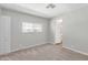 Comfortable bedroom with carpeting, a bright window, and practical closet space at 2650 W Union Hills Dr # 269, Phoenix, AZ 85027