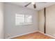 Bright bedroom with laminate flooring and a window providing natural light at 2650 W Union Hills Dr # 269, Phoenix, AZ 85027