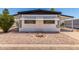 Charming mobile home with rock detail in the front yard and an awning covering the windows at 2650 W Union Hills Dr # 269, Phoenix, AZ 85027