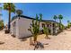 Exterior of a charming single-story home with covered porch, decorative cacti, and well-maintained desert landscaping at 2650 W Union Hills Dr # 269, Phoenix, AZ 85027