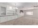 Cozy living room with built-in shelves, modern ceiling fan, and ample natural light at 2650 W Union Hills Dr # 269, Phoenix, AZ 85027