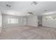 Light and bright living room with an open layout and neutral colored walls and carpet at 2650 W Union Hills Dr # 269, Phoenix, AZ 85027