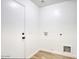 Practical laundry room with hookups for washer and dryer at 2676 E Mineral Park Rd, San Tan Valley, AZ 85143