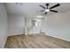 Open living space featuring wood flooring and neutral walls for a bright and airy feel at 2676 E Mineral Park Rd, San Tan Valley, AZ 85143