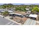 An aerial view of a well-maintained home with two carports and desert landscaping at 2956 E Sequoia Dr, Phoenix, AZ 85050