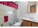 Bathroom featuring a shower, toilet, and vanity with a mirror at 2956 E Sequoia Dr, Phoenix, AZ 85050