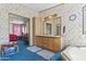 A bathroom with a blue carpet, double vanity, and access to the bedroom at 2956 E Sequoia Dr, Phoenix, AZ 85050