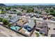 Aerial view showcasing neighborhood homes featuring private pools and covered patios at 3178 W Williams Dr, Phoenix, AZ 85027