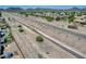 Aerial view of the neighborhood near walking trails with desert landscape and mountain views at 3178 W Williams Dr, Phoenix, AZ 85027