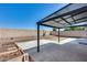 Backyard featuring a covered patio, low-maintenance landscaping, planter boxes, and concrete pavers at 3178 W Williams Dr, Phoenix, AZ 85027