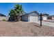 Charming single-story home with desert landscaping and a two-car garage at 3178 W Williams Dr, Phoenix, AZ 85027