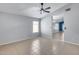Spacious living area with neutral color palette, tile flooring, and natural light at 3178 W Williams Dr, Phoenix, AZ 85027