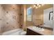 Bathroom showcasing decorative tile, a granite countertop, and a framed mirror over the sink at 36813 N 109Th Way, Scottsdale, AZ 85262