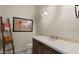 Bathroom featuring a sink with a tan countertop and decorative ladder at 36813 N 109Th Way, Scottsdale, AZ 85262