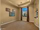 Comfortable bedroom with carpet and natural lighting at 36813 N 109Th Way, Scottsdale, AZ 85262