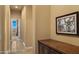 Hallway with tile flooring and artwork on the wall at 36813 N 109Th Way, Scottsdale, AZ 85262