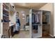 Walk-in closet with ample shelving and hanging space for organized storage of clothing at 36813 N 109Th Way, Scottsdale, AZ 85262