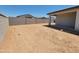 Spacious backyard is enclosed with a block wall; the covered patio makes this ideal for entertaining at 37168 W Prado St, Maricopa, AZ 85138