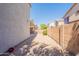 A view of the backyard, showing desert landscaping and the exterior of the home at 4010 W Fremont Rd, Phoenix, AZ 85041