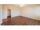 Bedroom featuring wood floors, a ceiling fan, and a closet at 4010 W Fremont Rd, Phoenix, AZ 85041