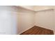Walk-in closet featuring wood-look flooring and shelving at 4010 W Fremont Rd, Phoenix, AZ 85041