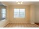 Bright dining room with tile floors, a decorative light fixture, and natural light at 4010 W Fremont Rd, Phoenix, AZ 85041