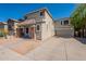 Charming two-story home featuring an attached garage and spacious driveway at 4010 W Fremont Rd, Phoenix, AZ 85041