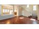 Inviting living space with wood floors and an open staircase, perfect for entertaining at 4010 W Fremont Rd, Phoenix, AZ 85041